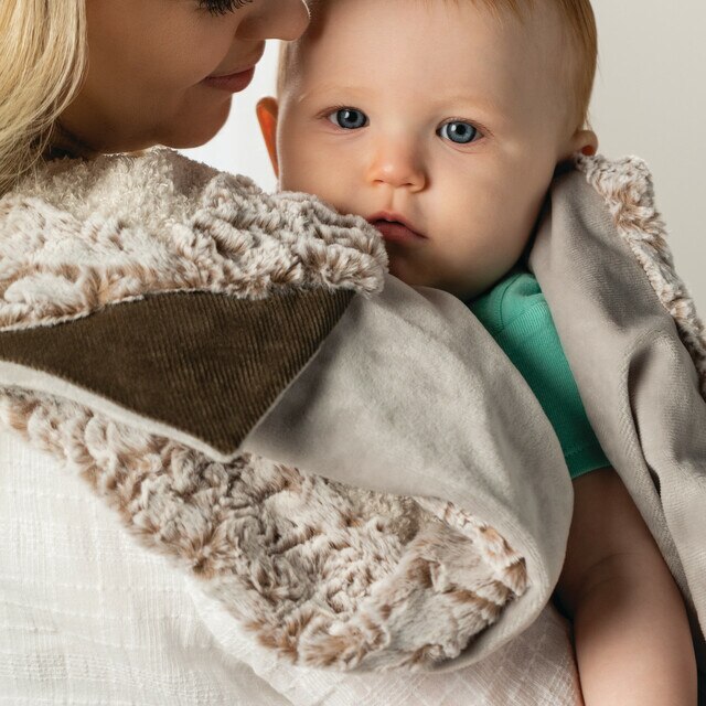 Baby Giving Blanket